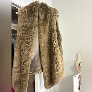 Chicest fur vest perfect for the cold winter ahead. Excellent condition!!